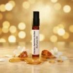Experience golden radiance with Honey Jasmine Amber Perfume Oil, a luxurious floral amber fragrance inspired by Paco Rabanne Lady Million (for reference only). Blending honey, jasmine, and amber, this alcohol-free perfume oil embodies feminine confidence, sensual warmth, and lasting elegance.