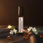 Experience Jasmine Amber Leather Perfume Oil, inspired by Tom Ford Jasmin Rouge (for reference only). A sensual blend of exotic jasmine, warm amber, and smooth leather — bold, elegant, and unforgettable. 100% pure perfume oil, long-lasting and alcohol-free.