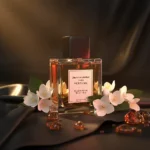 Experience Jasmine Amber Leather Perfume Oil, inspired by Tom Ford Jasmin Rouge (for reference only). A sensual blend of exotic jasmine, warm amber, and smooth leather — bold, elegant, and unforgettable. 100% pure perfume oil, long-lasting and alcohol-free.