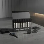 Men’s perfume oil discovery kit Set A – 10 small 2ml perfume vials displayed on a dark marble surface with amber lighting, evoking masculine elegance.