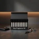 Starter Discovery Perfume Oil Kit Men’s perfume oil discovery kit Set A – 10 small 2ml perfume vials displayed on a dark marble surface with amber lighting, evoking masculine elegance.