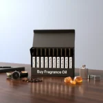 Men’s perfume oil discovery kit Set B – 10 mini glass vials arranged on dark wood with amber and leather details, representing masculine luxury scents.