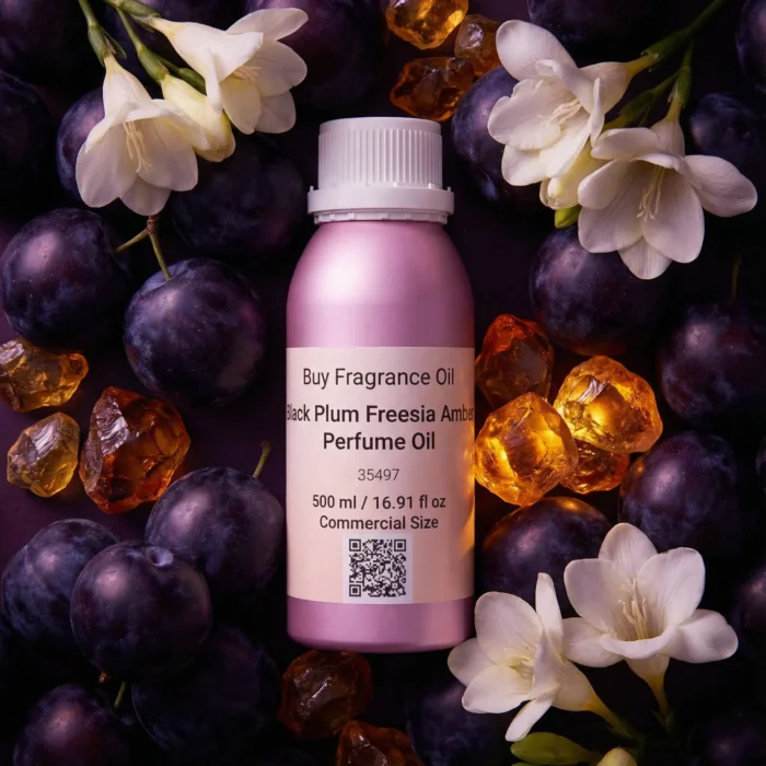 Black Plum Freesia Amber perfume oil bottle with dark plums, freesia flowers and glowing amber crystals under night lighting.