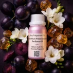 Black Plum Freesia Amber perfume oil bottle with dark plums, freesia flowers and glowing amber crystals under night lighting.