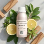 Citrus Green Sandal perfume oil bottle with fresh lemon, green leaves and smooth sandalwood in clean daylight setting.