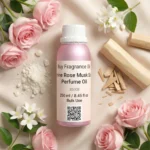 Jasmine Rose Musk Sandal perfume oil bottle with soft pink roses, jasmine flowers, white musk and creamy sandalwood in elegant daylight setting.