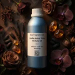 Vanilla Amber Tonka perfume oil bottle with golden amber resin, vanilla pods and tonka beans in dark masculine luxury setting.