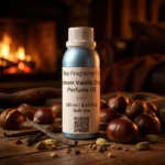 Cardamom Vanilla Chestnut perfume oil bottle with warm amber tones, roasted chestnut sweetness and spicy masculine evening atmosphere.