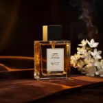 Leather Amber Jasmine perfume oil bottle with suede leather texture, warm amber glow and elegant jasmine atmosphere.