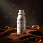 Leather saffron amber perfume oil with golden spice tones, smooth suede leather texture and warm resinous amber glow.