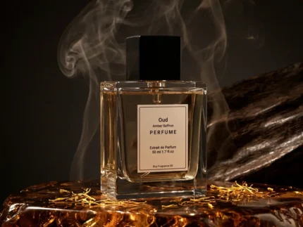 Oud amber saffron perfume oil with golden oriental glow, dark oud wood texture and warm resinous amber atmosphere.