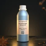 Oud amber spice perfume oil background with dark smoky oud wood, glowing amber resin and warm oriental spice atmosphere.