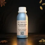 Oud amber spice perfume oil background with dark smoky oud wood, glowing amber resin and warm oriental spice atmosphere.